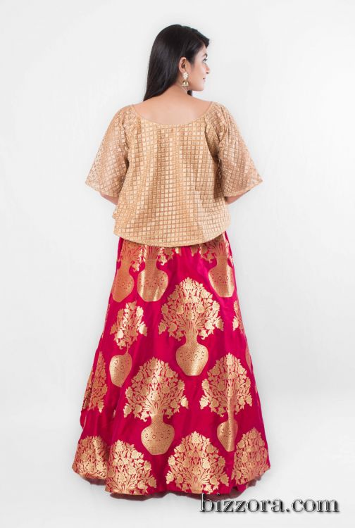 red lehenga with gold blouse